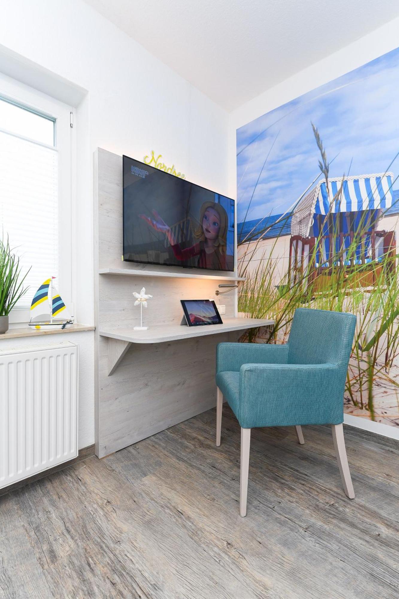 Ferienwohnungen Im Haus Strandkorb Bensersiel Exterior foto